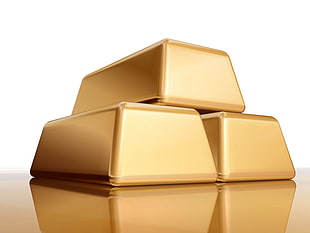 pile of three gold-colored bars